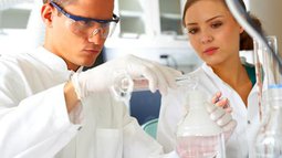 male and female researcher in laboratory